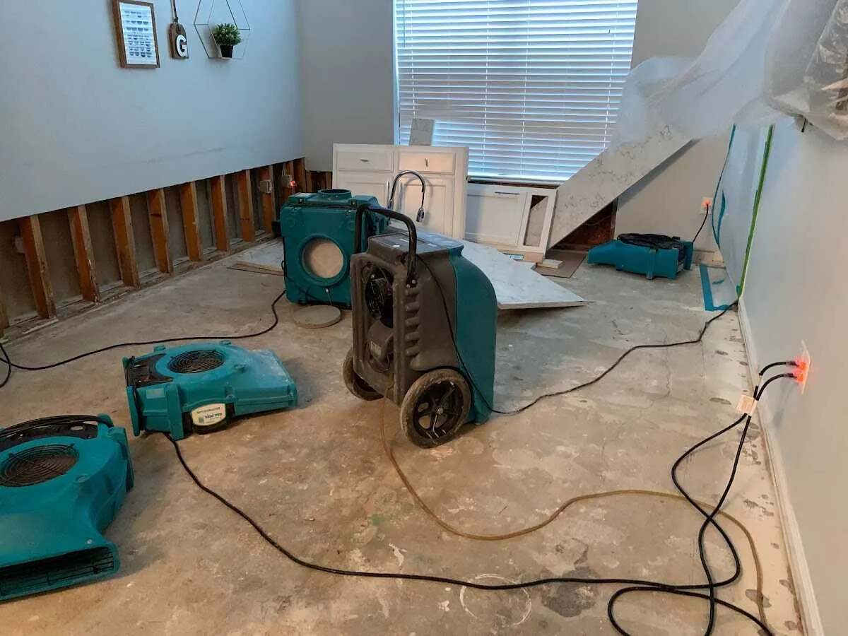 Dehumidifier in flood-cut room for Water Damage Restoration in Sun City Center
